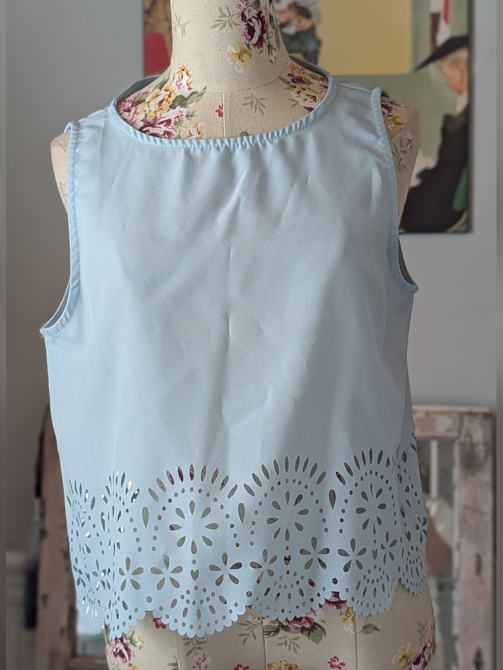Sleeveless Light Blue Laser-Cut Hem Top